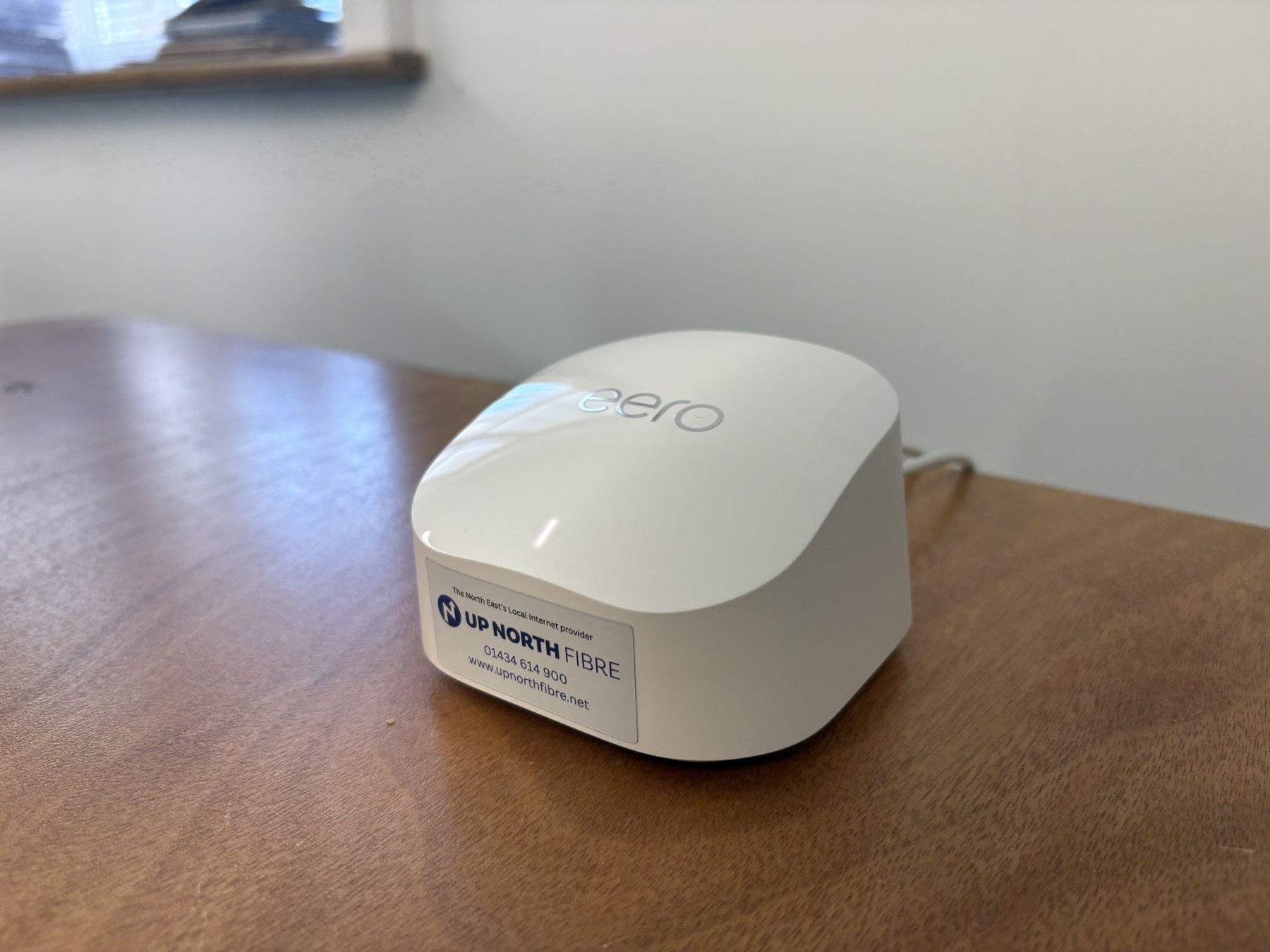 Up North Fibre gigabit broadband router on a table