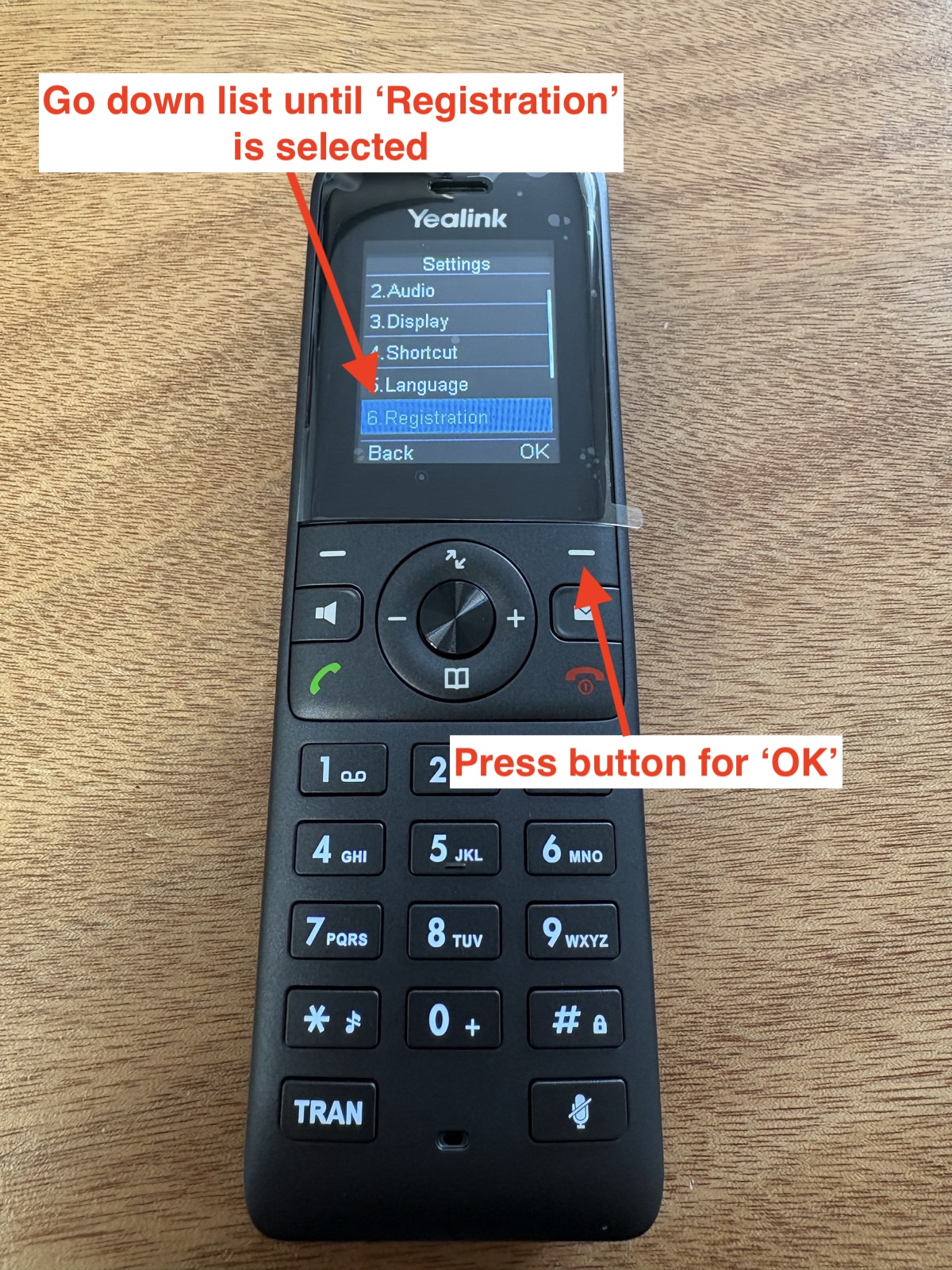 Yealink handset with the Registration option selected in Settings