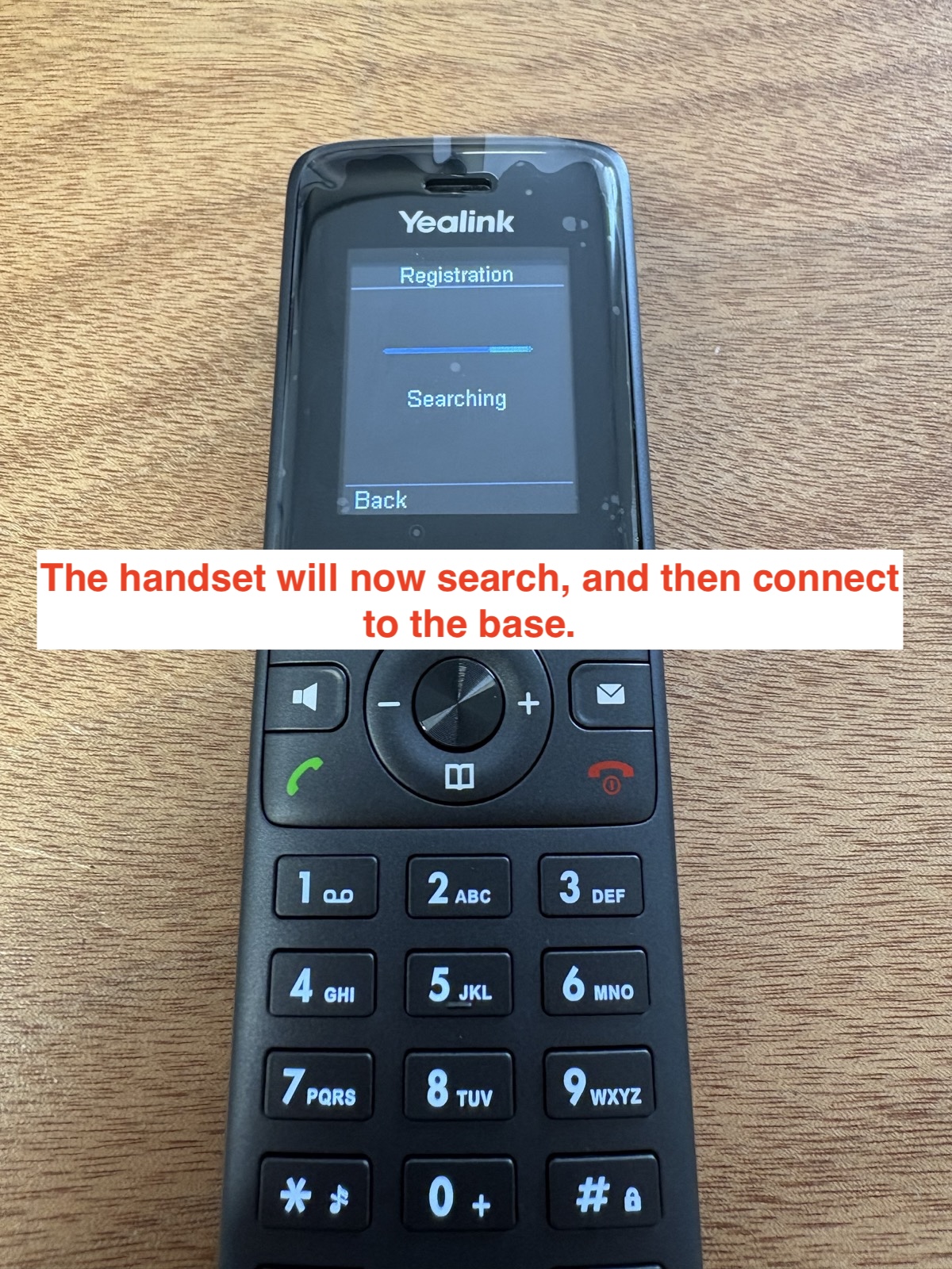 Yealink handset registration screen searching for the base